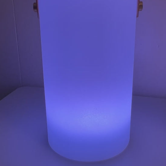 HD Designs Solar Color Changing Lantern illuminated in blue light in a dark room Video
